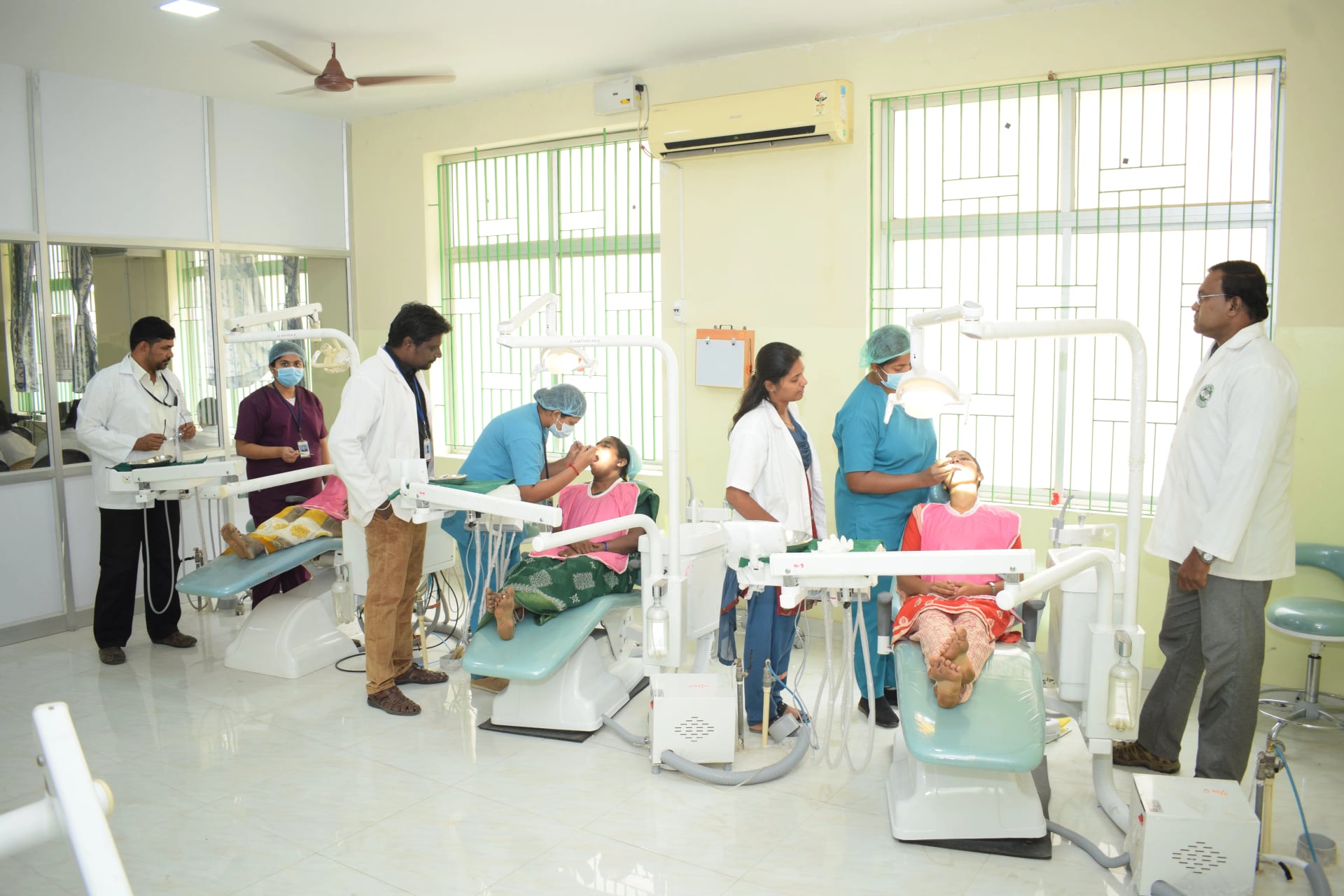 JKKN Dental College clinical training with dental chairs and faculty treating patients