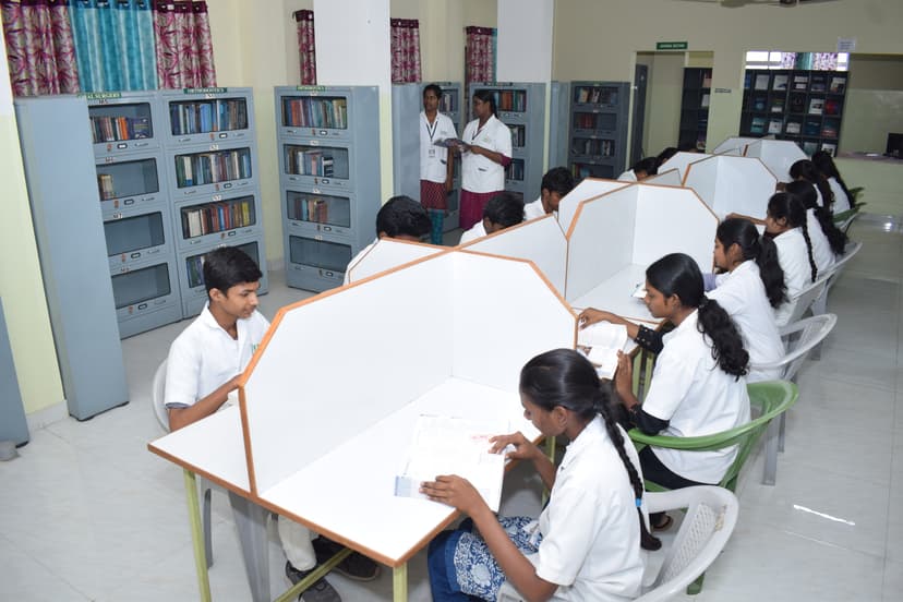 JKKN Dental College library study area with students reading at study desks